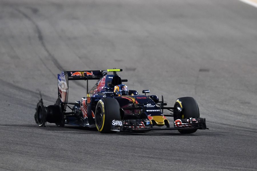 Carlos Sainz suffers the rear tyre puncture