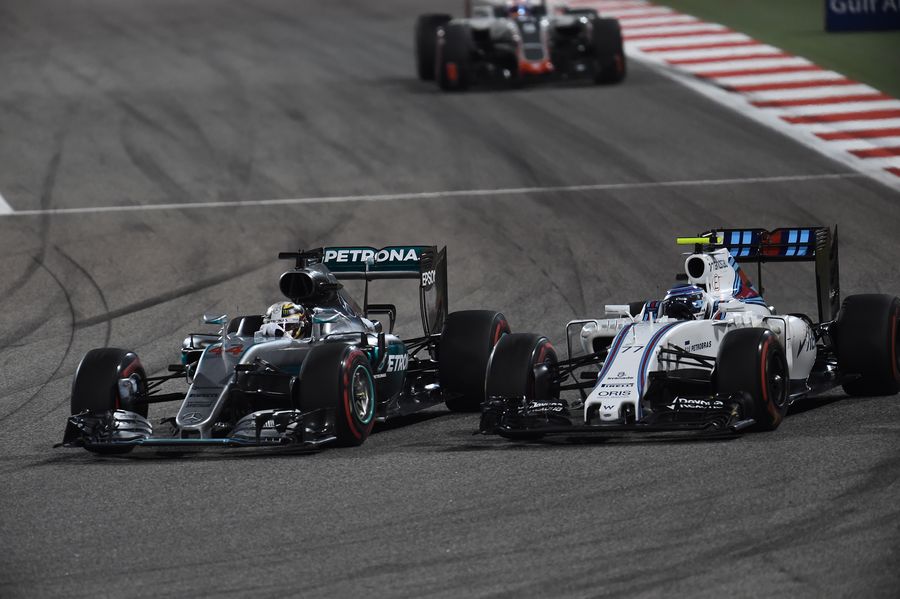 Valtteri Bottas battles for a position with Lewis Hamilton