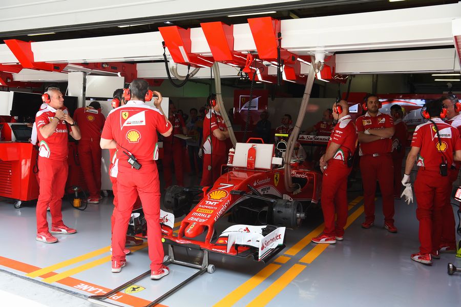 Kimi Raikkonen prepares for his run in the garage