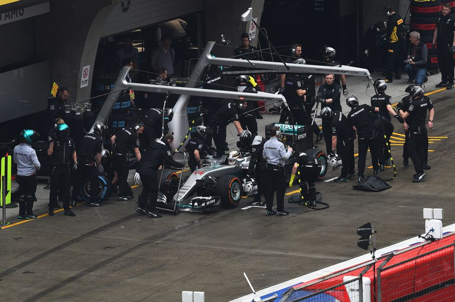Lewis Hamilton makes a pit stop after his installation lap