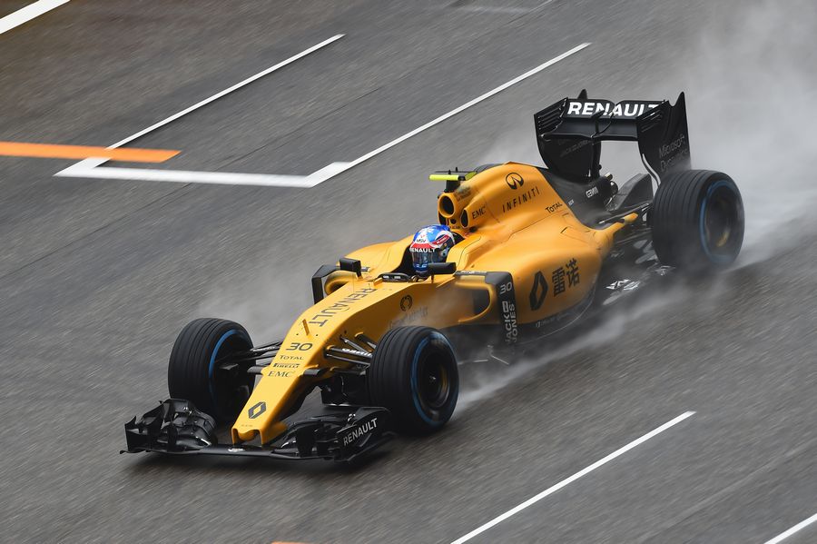Jolyon Palmer gets the power down on wet track