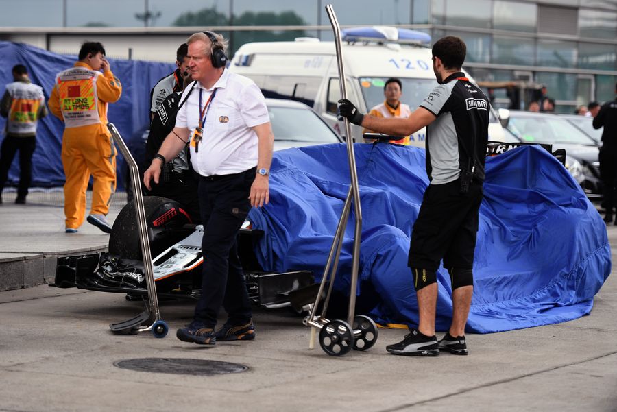 Nico Hulkenberg's VJM09 is recovered to the pit