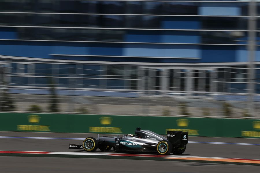 Lewis Hamilton gets the power down in the Mercedes