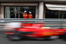 Felipe Massa flies past the shops