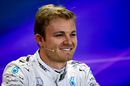 Nico Rosberg answers a question with a smile on his face