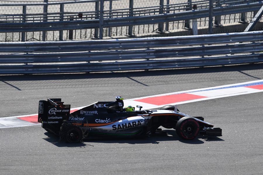 Sergio Perez suffers from a rear puncture on lap one