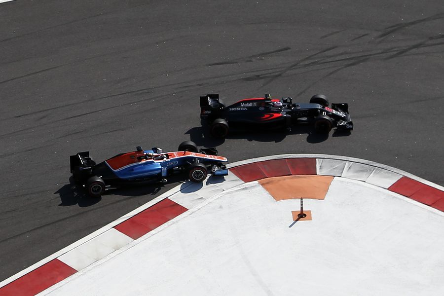 Jenson Button and Pascal Wehrlein battle for a position