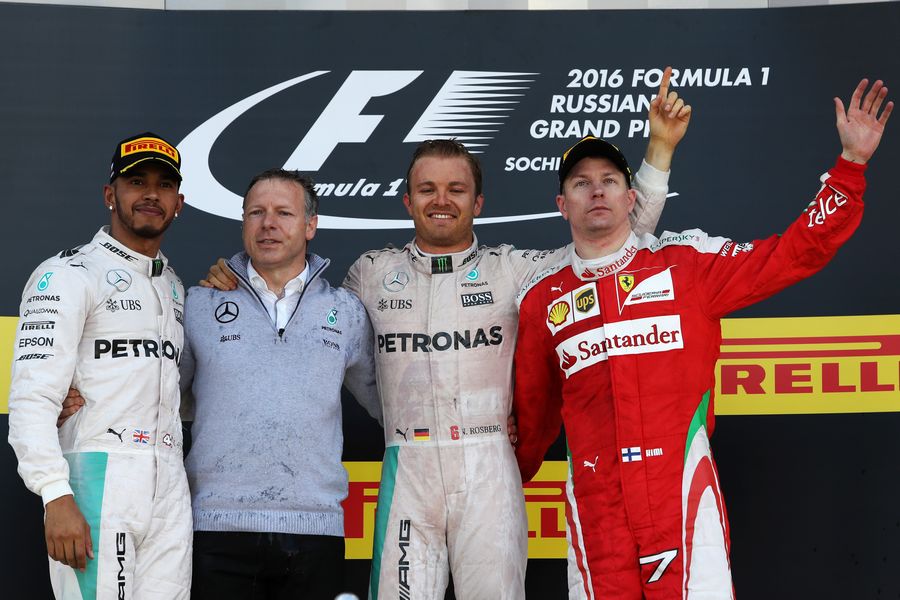 Top 3 drivers acknowledge the crowd during a podium ceremony