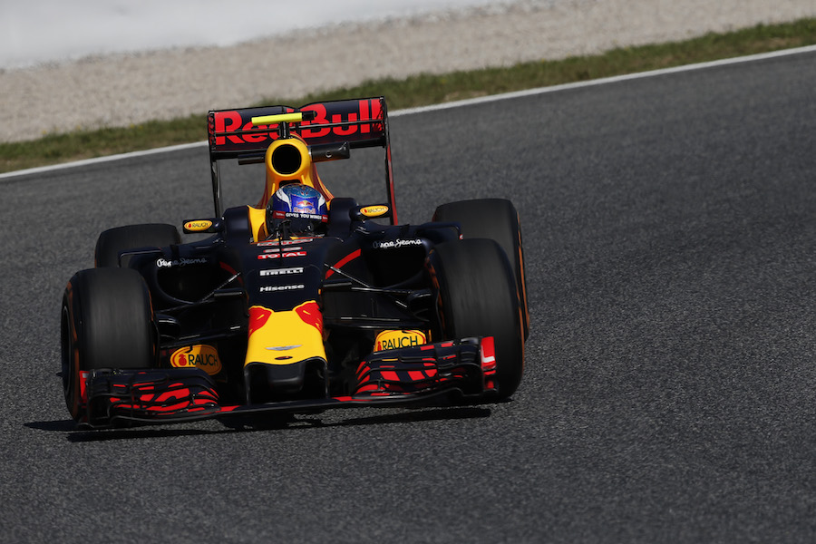 Max Verstappen turns into the apex in the Red Bull