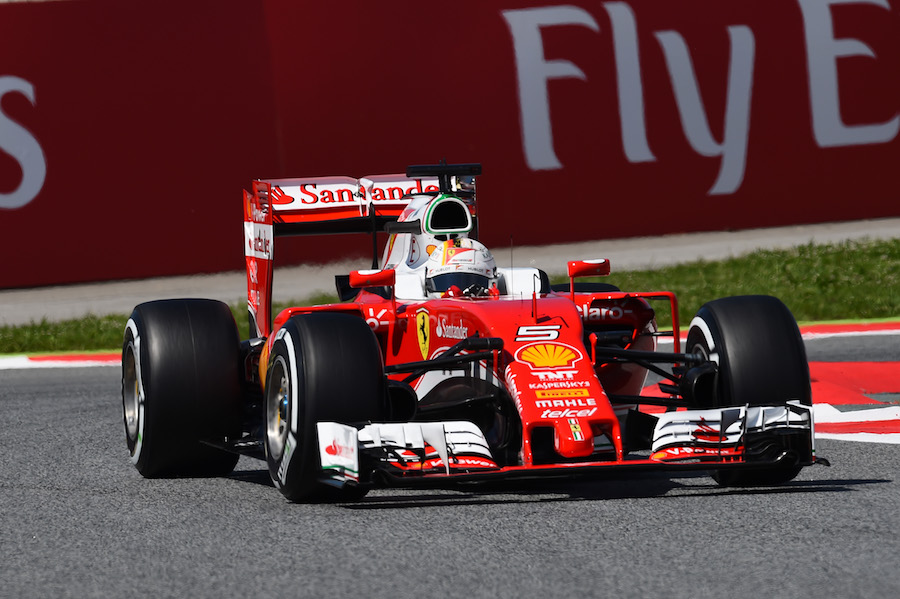 Sebastian Vettel puts on a set of medium tyres