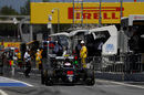 Jenson Button exits the pit lane