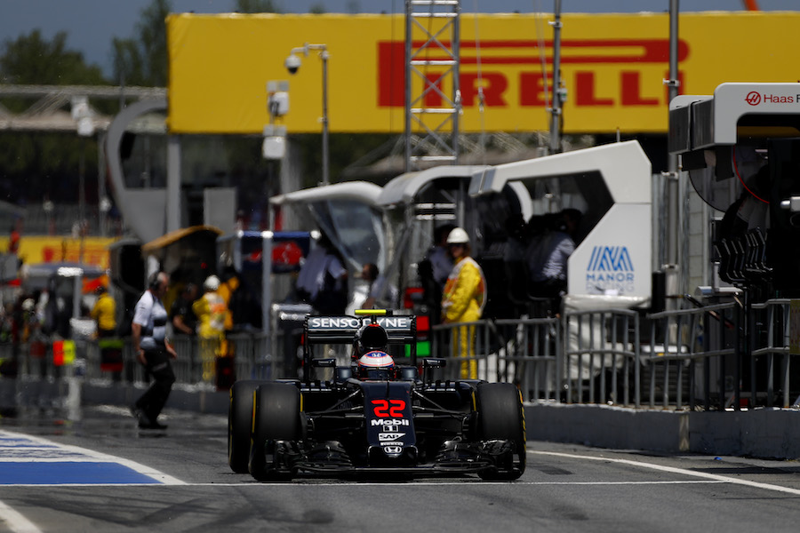 Jenson Button exits the pit lane