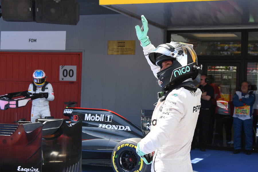 Nico Rosberg waves a hand after qualifying