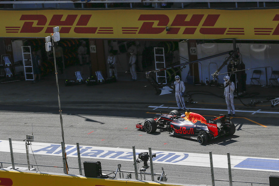 Daniel Ricciardo pits with rear puncture