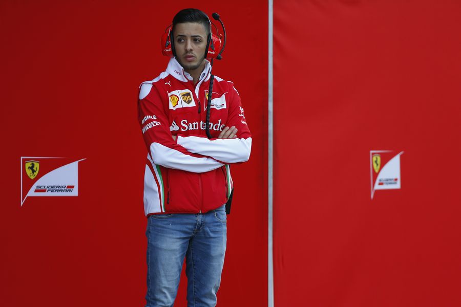 Ferrari test driver Antonio Fuoco watchs for the test session
