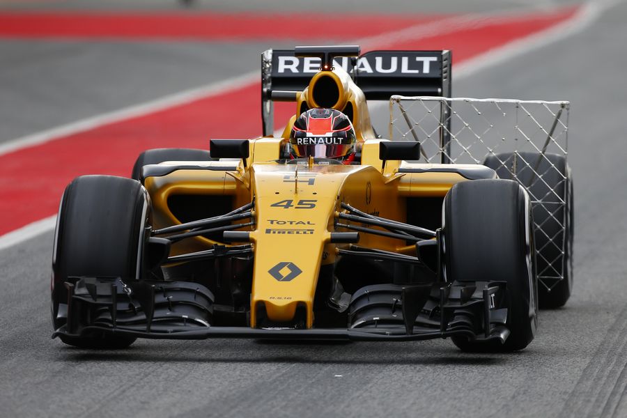 Esteban Ocon drives the Renault down the pit lane with an aero measuring device attached