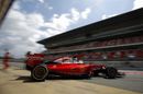 Sebastian Vettel leaves the garage for test runs