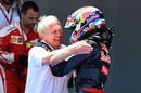 Max Verstappen celebrates with Dr Helmut Marko in parc ferme for his first win