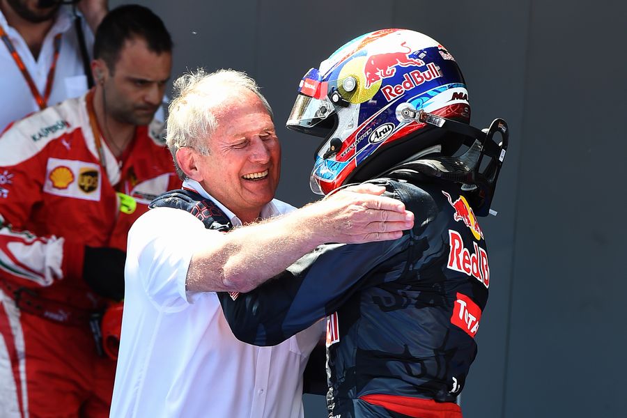 Max Verstappen celebrates with Dr Helmut Marko in parc ferme for his first win