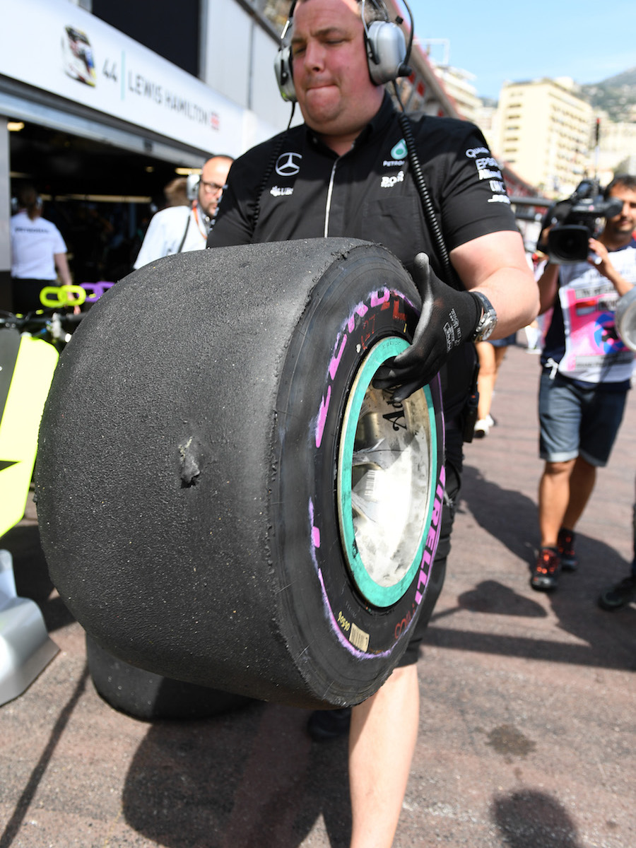 Nico Rosberg suffers a puncture