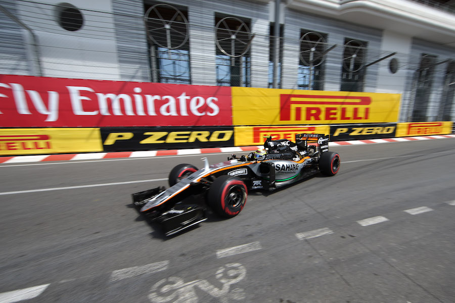 Sergio Perez works hard to keep pace