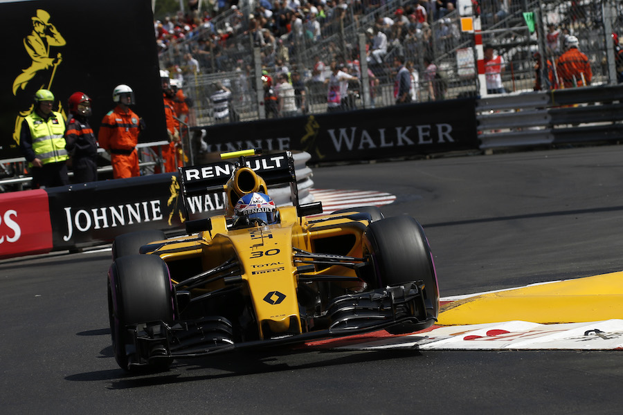 Jolyon Palmer finds a bit of air on the exit to the Swimming Pool