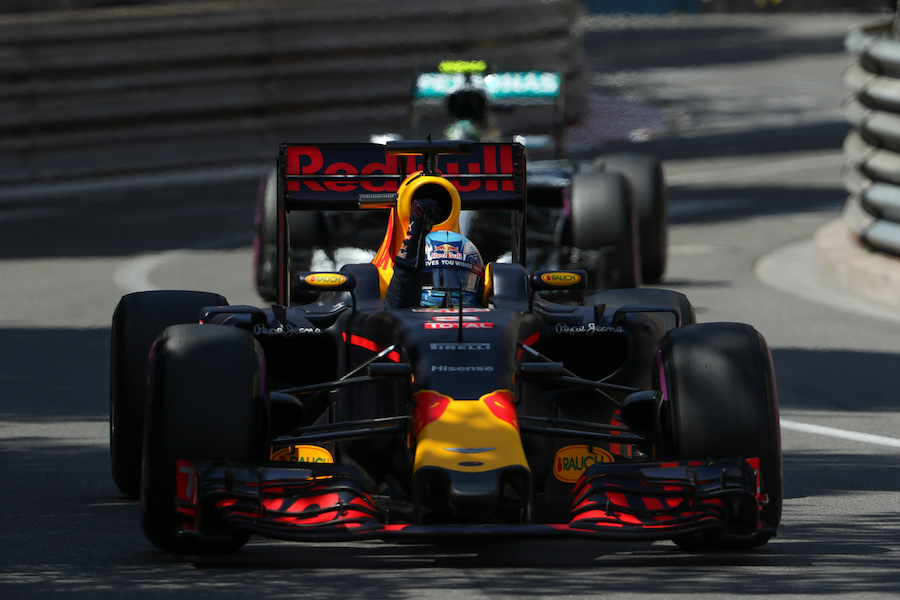 Daniel Ricciardo celebrates on taking pole position in the cockpit