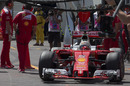Sebastian Vettel leaves the pit for the run