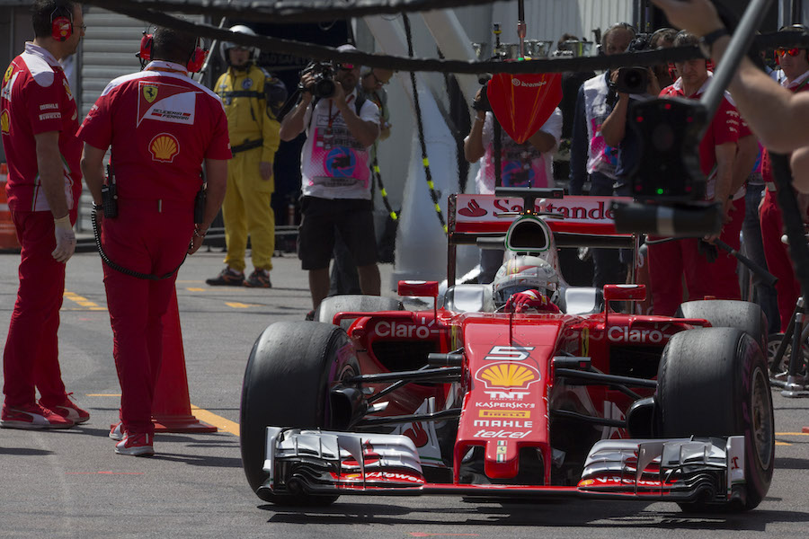 Sebastian Vettel leaves the pit for the run