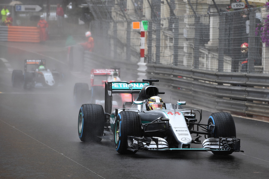 Lewis Hamilton runs through the wet track