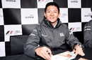 Rio Haryanto signs autographs for the fans