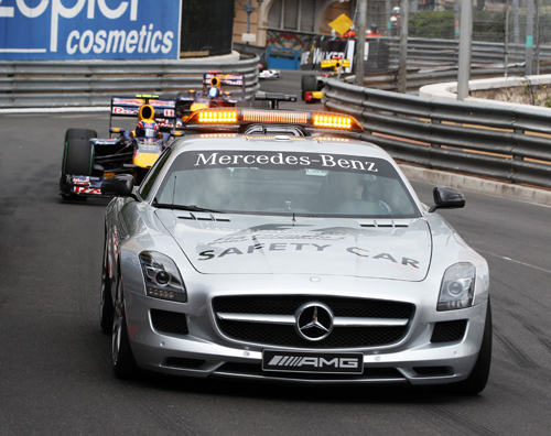 Mark Webber trails the safety car
