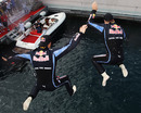Mark Webber and Sebastian Vettel plunge into the sea