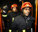 Karun Chandhok and Bruno Senna play fireman