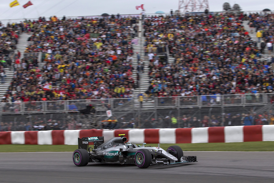Nico Rosberg speeds past fans