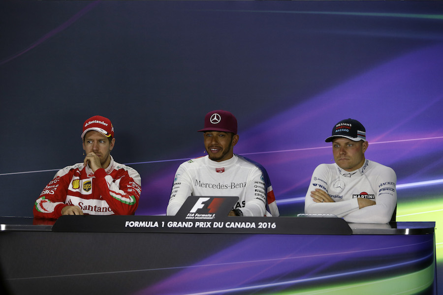 Lewis Hamilton, Sebastian Vettel and Valtteri Bottas in the press conference after the race