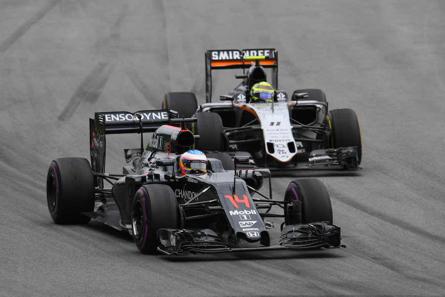 Fernando Alonso leads Sergio Perez