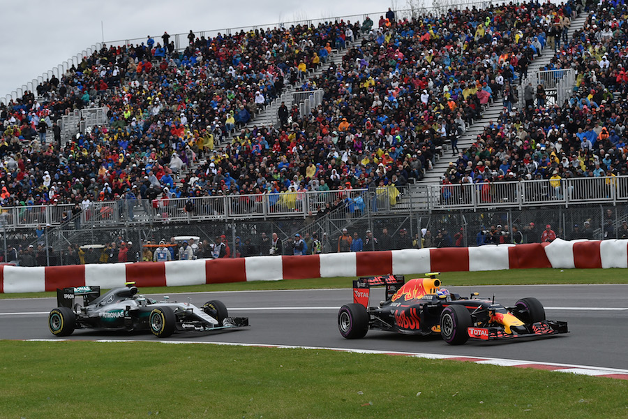 Nico Rosberg tries to overtake Max Verstappen
