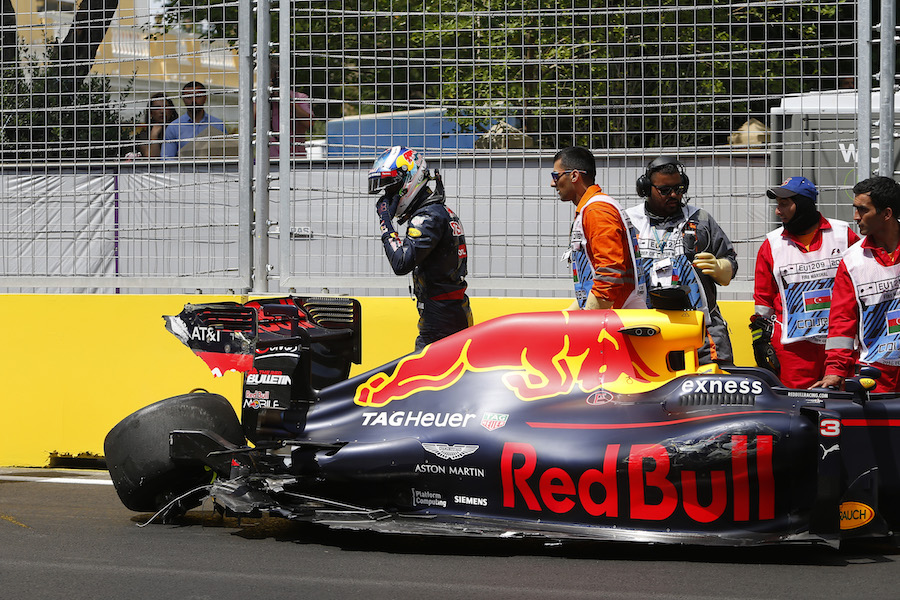 Daniel Ricciardo leaves his car after crashed in FP1