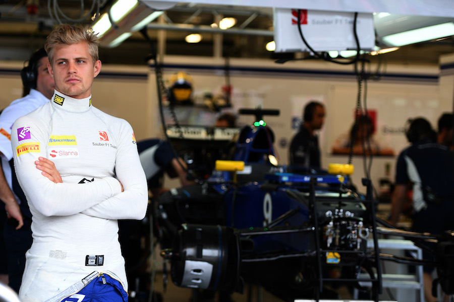 Marcus Ericsson waits for getting work done by the team