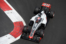 Romain Grosjean rounds the apex in the Haas