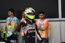 Sergio Perez poses in parc ferme after qualifying second