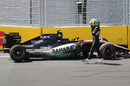 Sergio Perez leaves his car after crashed in FP3