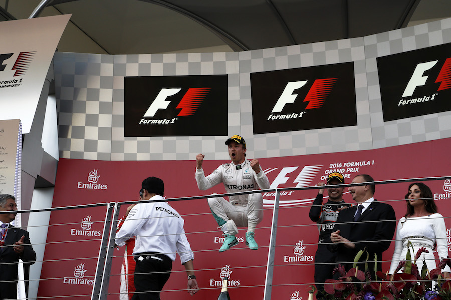 A delighted Nico Rosberg jumps for joy 