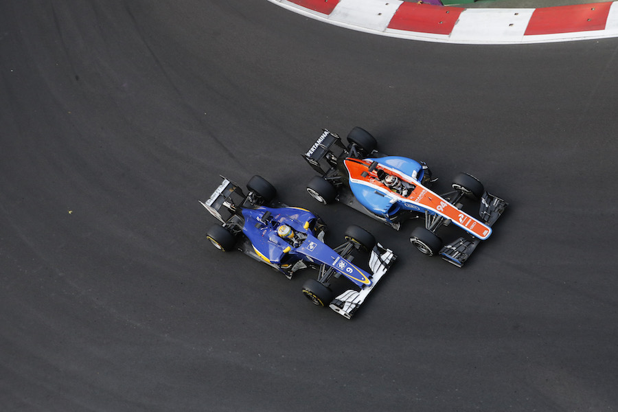 Pascal Wehrlein and Marcus Ericsson fight a position