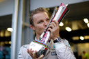Nico Rosberg kisses the trophy