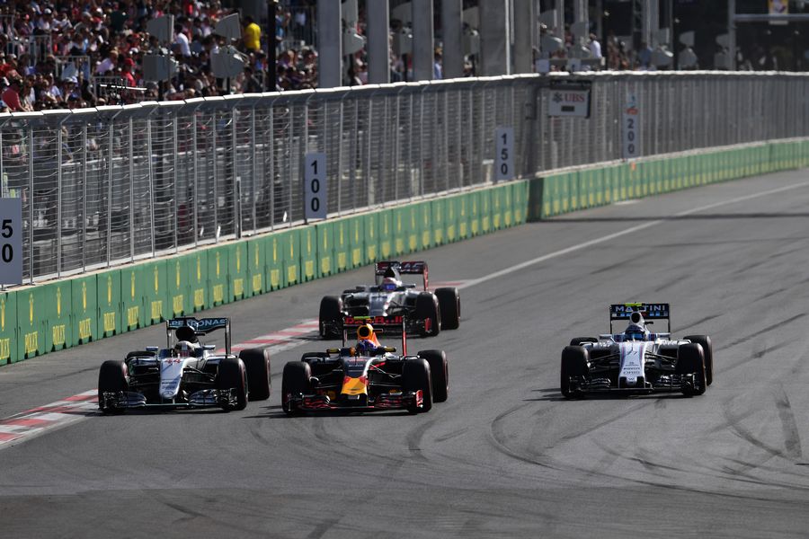 Lewis Hamilton, Max Verstappen and Valtteri Bottas battle for a position