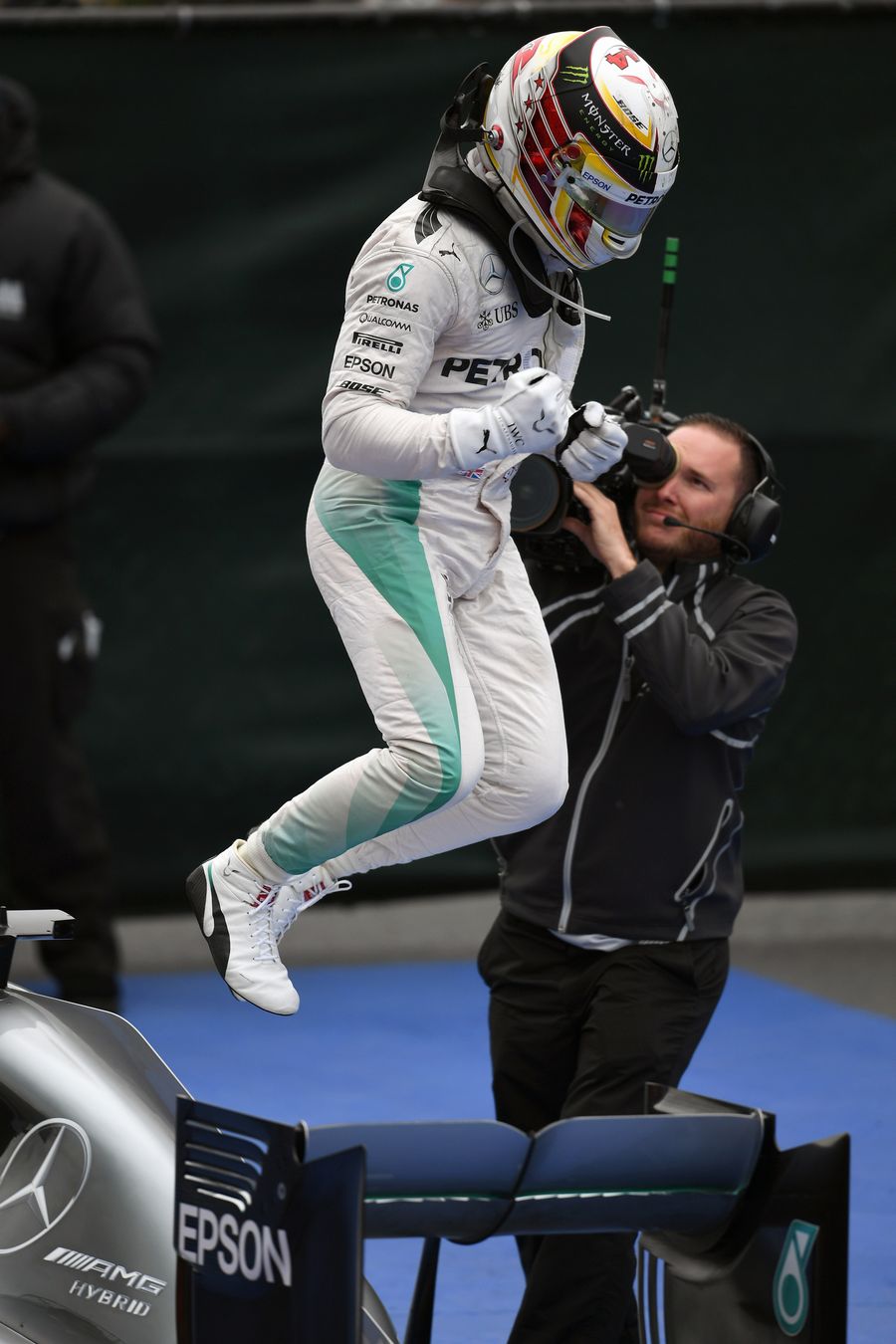 Lewis Hamilton celebrates in parc ferme for his win