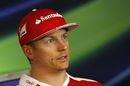 Kimi Raikkonen answers some questions from media during the press conference