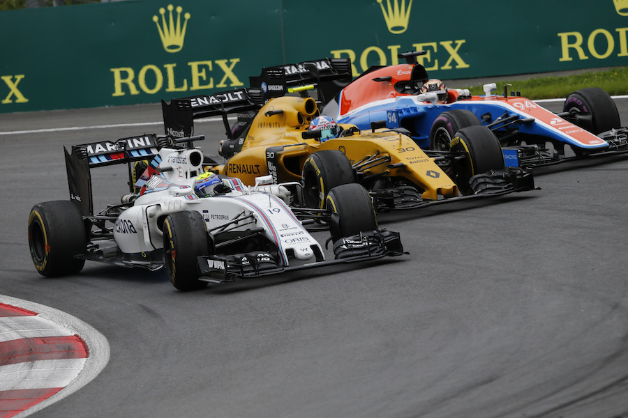 Felipe Massa, Jolyon Palmer and Pascal Wehrlein battle for a position